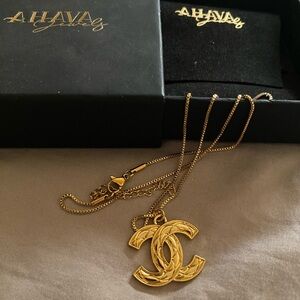 AHAVA CHANNEL Gold-Tone Pendant Necklace